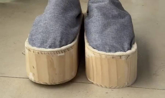 MoxiSlips wooden moxibustion slippers — chamber drawer open with mugwort sticks
