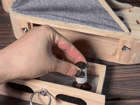 placing a mugwort stick into the MoxiSlips chamber drawer